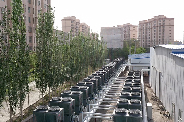 采暖新风尚!新疆尉犁县新西域家园32万㎡集中供暖用格美粤空气能,环保又节能